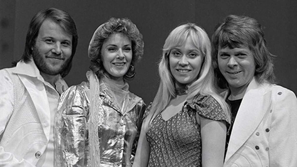 ABBA biography portrait — posing for TopPop in 1974.