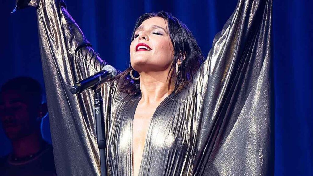 Jessie Ware biography portrait — English singer and songwriter performing at Alexandra Palace.