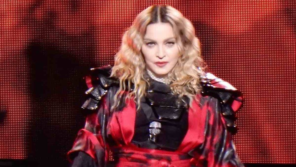 Madonna biography portrait — performing live during the Rebel Heart Tour in Amsterdam.