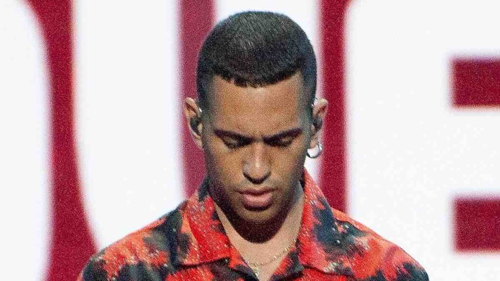 Mahmood biography portrait — performing on stage during Eurovision rehearsal.