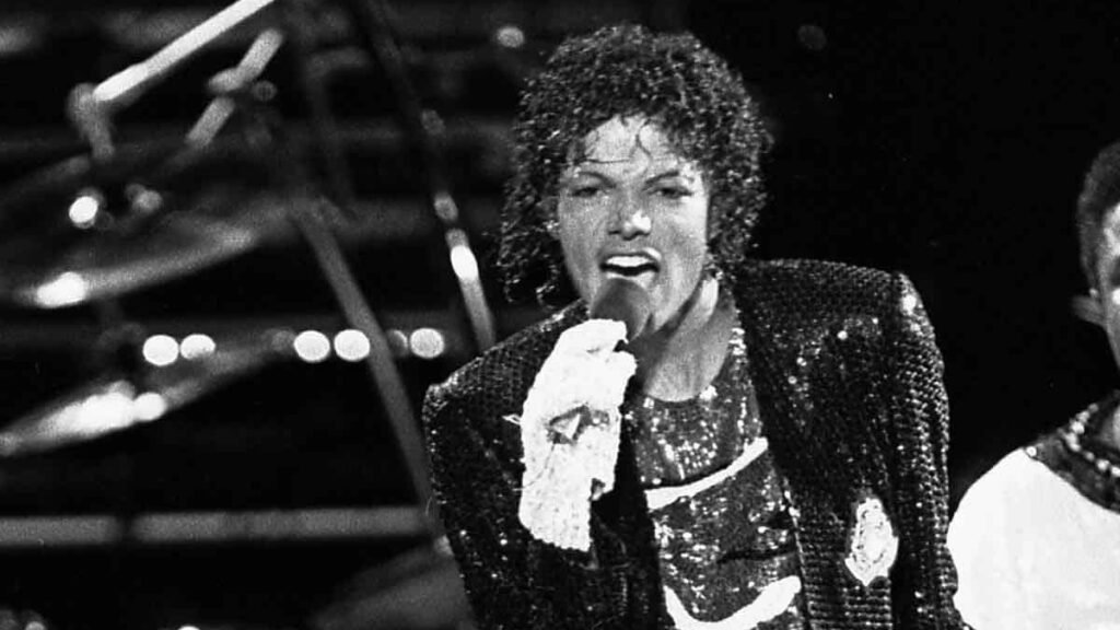 Michael Jackson biography portrait — performing live during the Victory Tour in 1984.