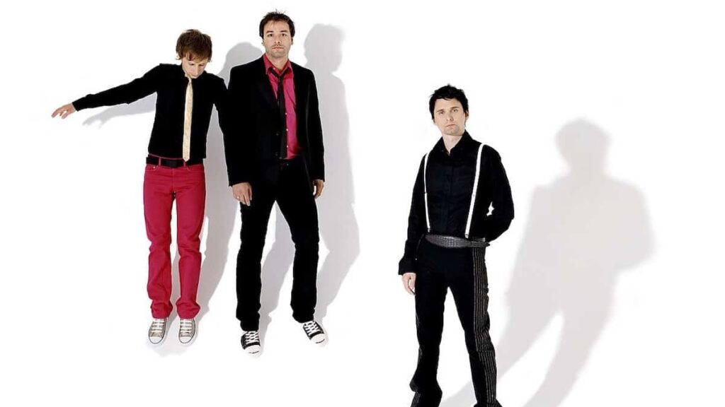 Muse biography portrait — promotional photo for Black Holes and Revelations in 2006.