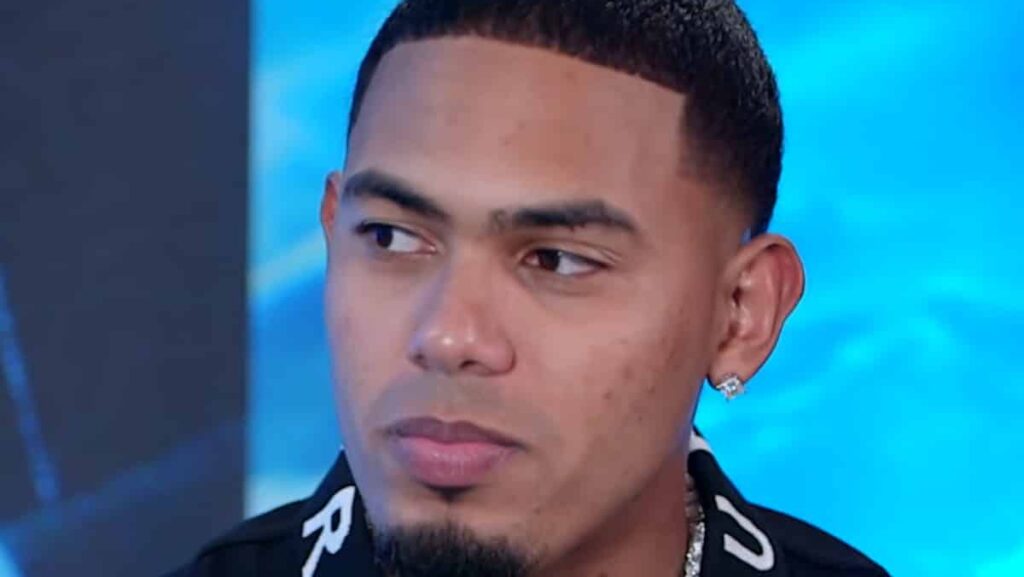 Myke Towers biography portrait — urban music star during a professional interview.