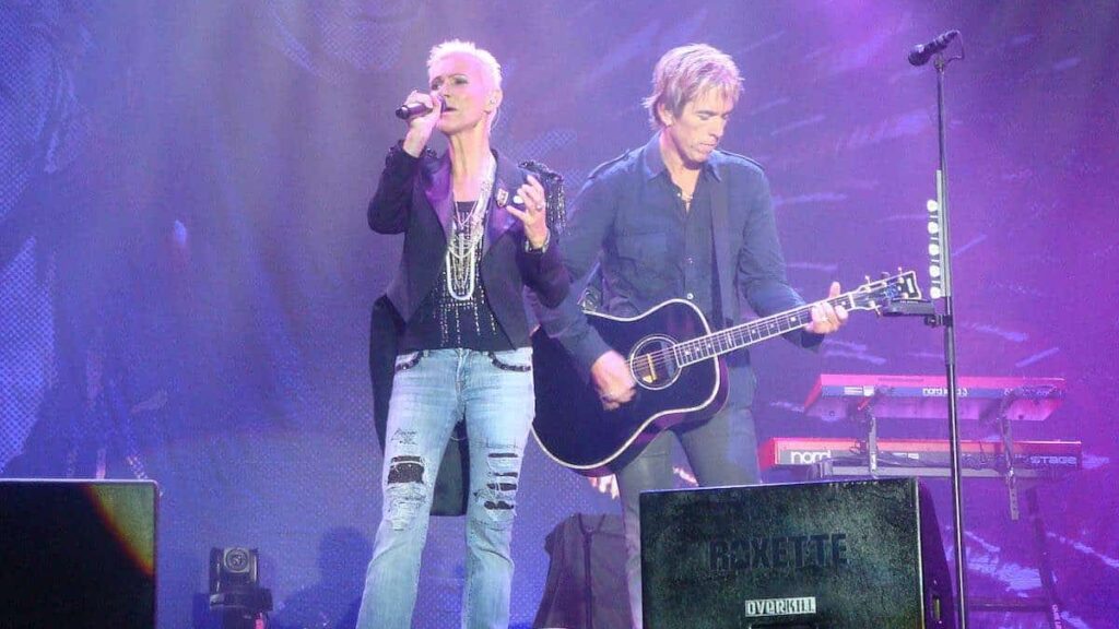 Roxette biography portrait — Marie Fredriksson and Per Gessle performing live in Halmstad in 2010.