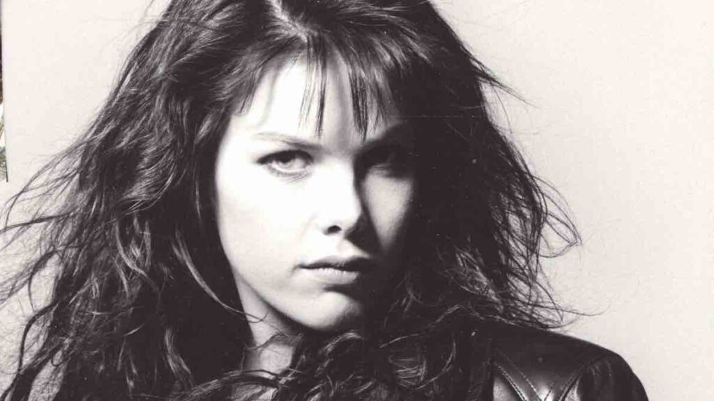 C.C. Catch biography portrait — performing live on stage as the disco queen.