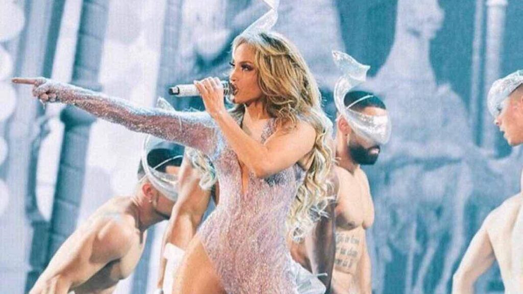 Jennifer Lopez biography portrait — performing live during It's My Party tour.