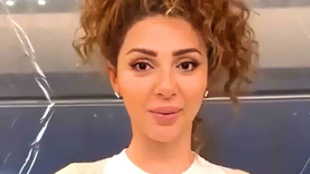 Myriam Fares biography portrait — close up shot from MTV Lebanon interview.