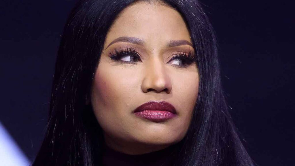 Nicki Minaj biography portrait — smiling close up during a public appearance in 2025.