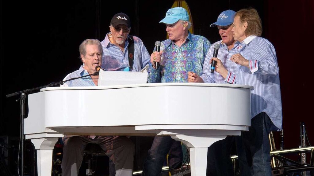 The Beach Boys biography portrait — legendary rock band performing live on stage in 2012.