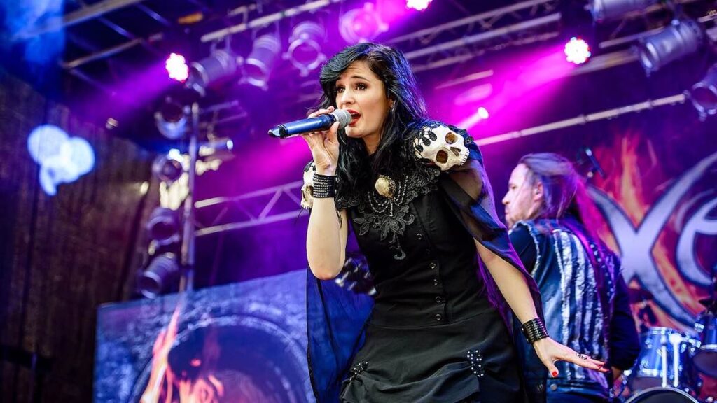 Dianne van Giersbergen biography portrait — performing on stage at Castle Rock Festival in 2016.