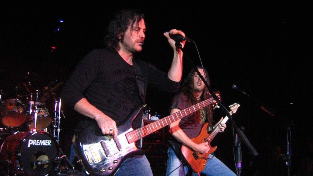 Kip Winger biography portrait — performing live at Avalon in Santa Clara, California.